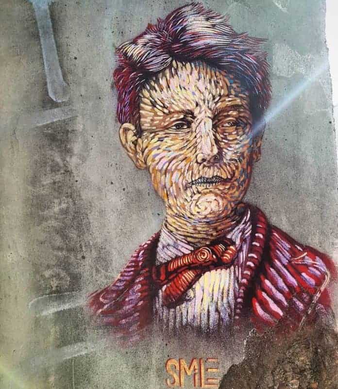 street art vitry sur seine pochoir de smile portrait d'arthur rimbaud